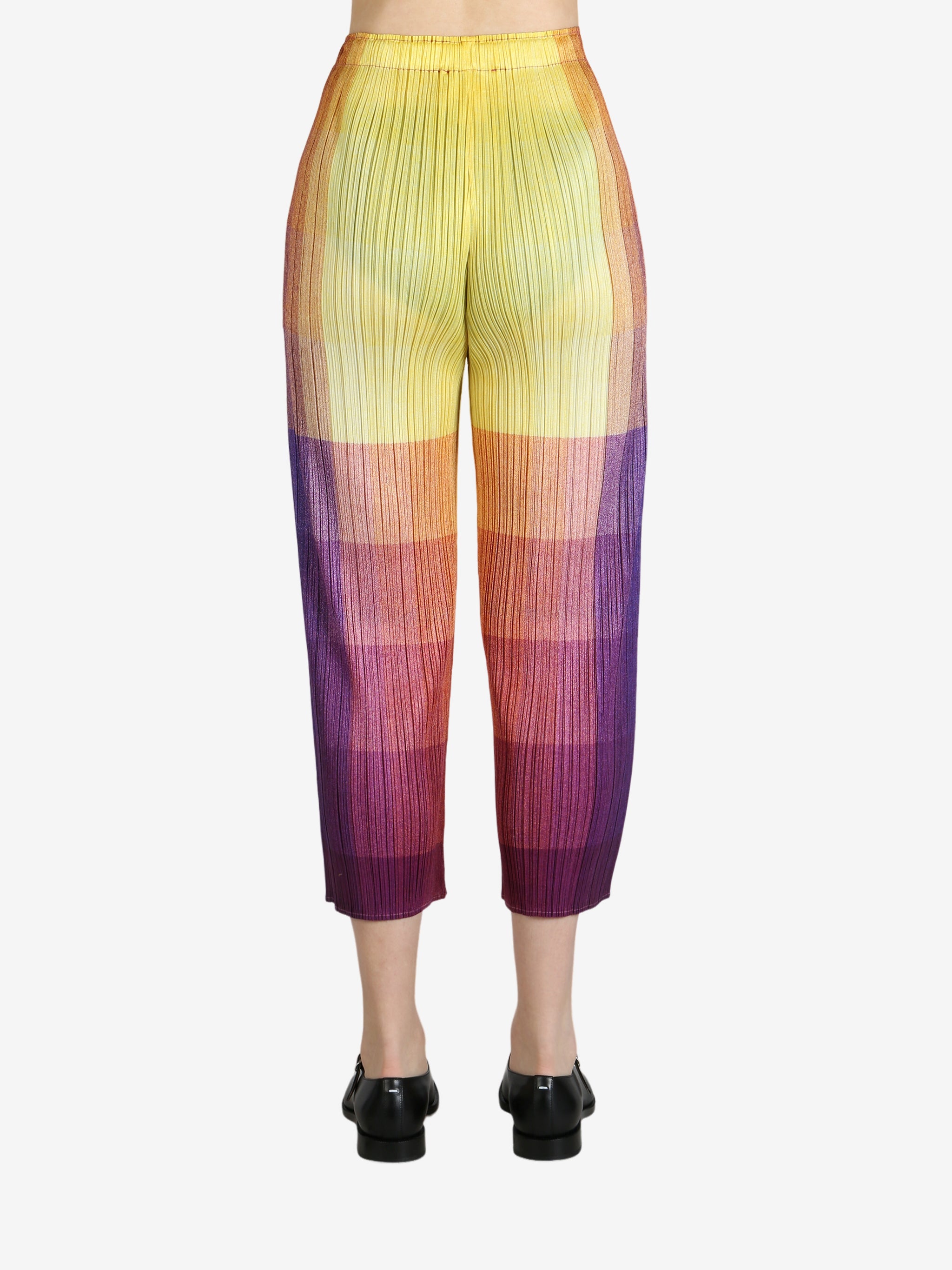 Colorful pants worn by a person, showing the pants's fit