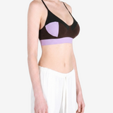 Purple activewear worn by a person, showing the activewear fit
