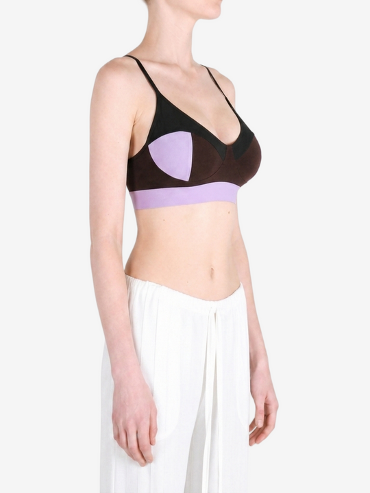 Purple activewear worn by a person, showing the activewear fit