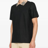 Black t-shirt worn by a person, showing the t-shirt fit