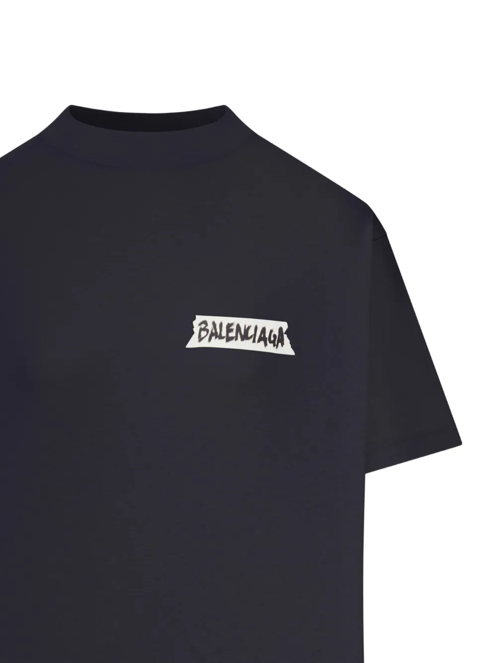 Close up of black t-shirt, showing texture of the cotton fabric