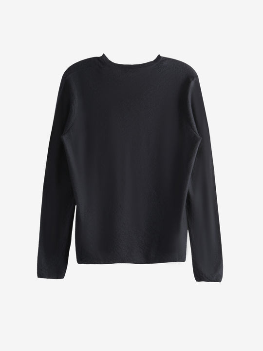 Black top, back view showing relaxed fit