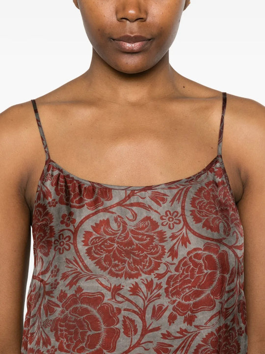 Close up of red dresses, showing texture of the viscose and cupro fabric