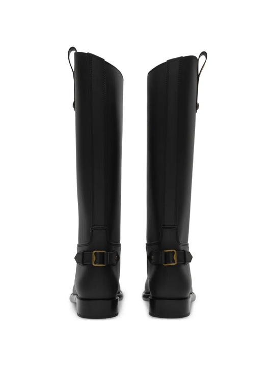 Black boots, back view