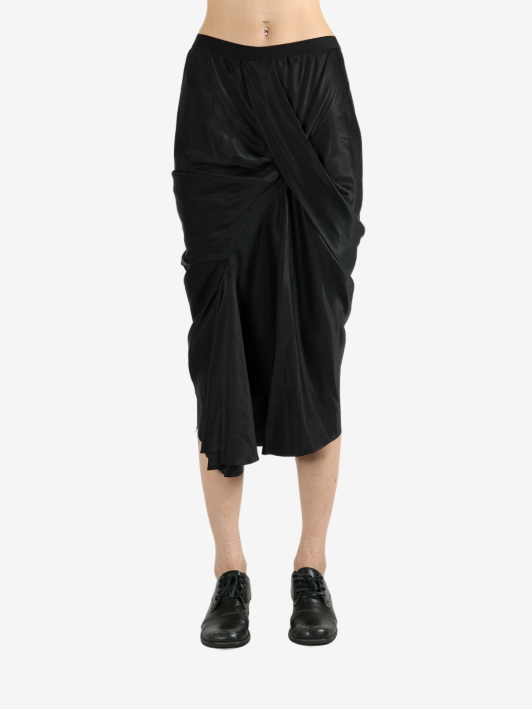 Black skirt worn by a person, showing the skirt's fit