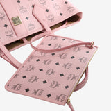 Close up of pink bag, showing texture of the fabric