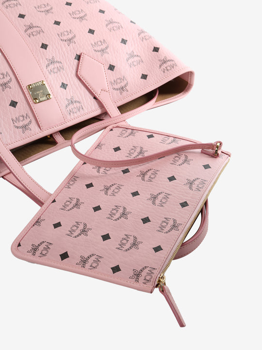 Close up of pink bag, showing texture of the fabric