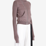 Brown hoodie worn by a person, showing the hoodie fit