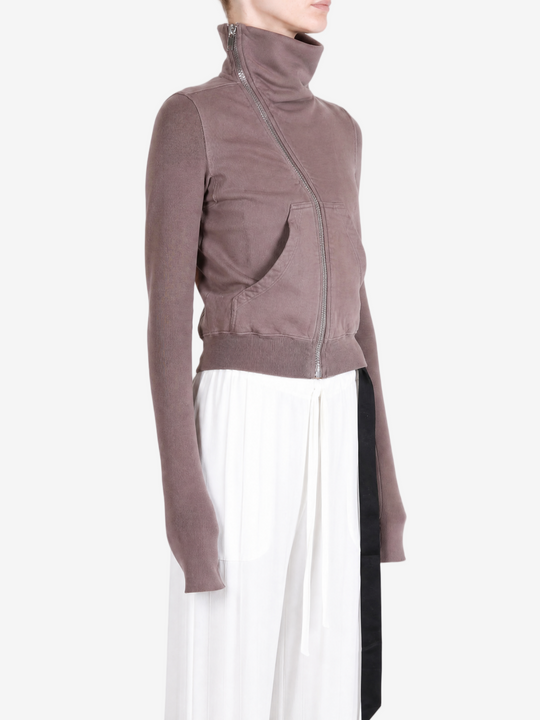Brown hoodie worn by a person, showing the hoodie fit