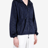 Navy jacket worn by a person, showing the jacket fit
