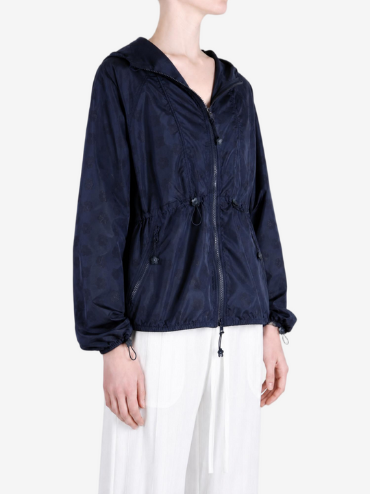 Navy jacket worn by a person, showing the jacket fit