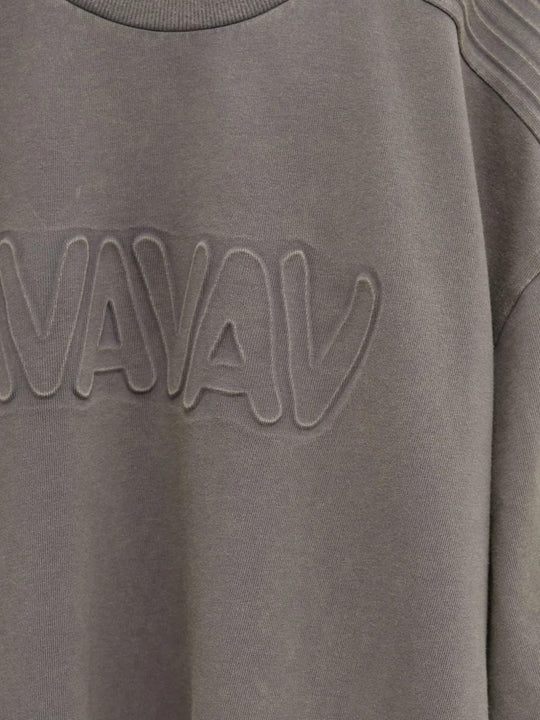 Close up of Grey t-shirt, showing texture of the 100% cotton fabric