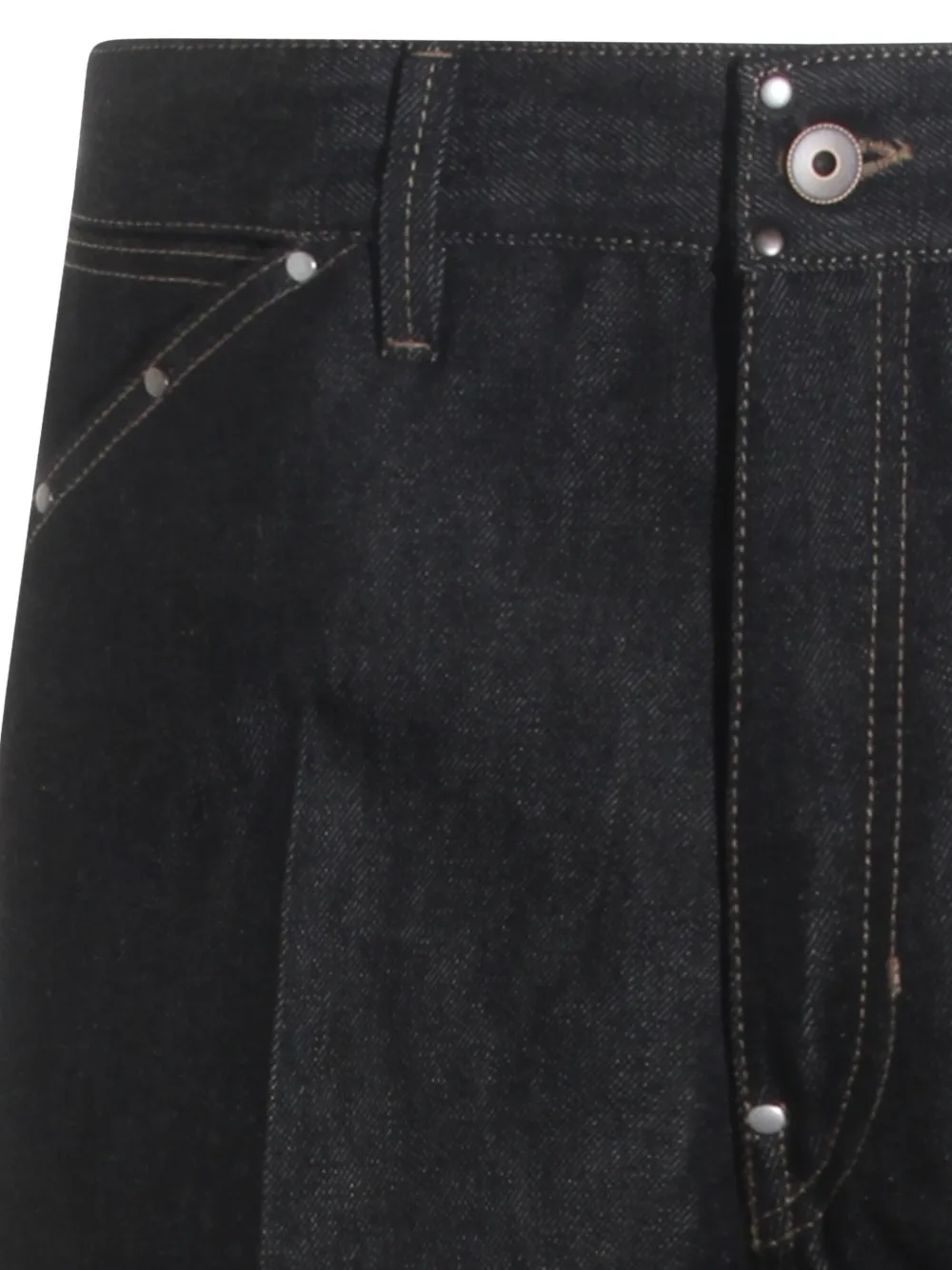 Close up of black pant, showing texture of the cotton fabric