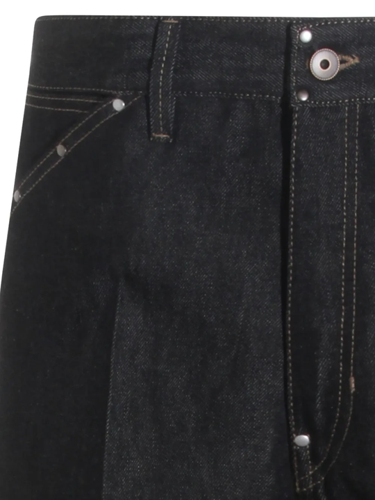 Close up of black pant, showing texture of the cotton fabric