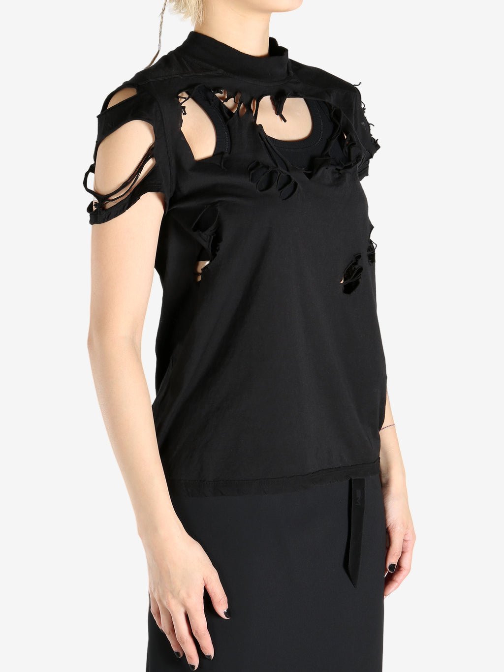 Black tops worn by a person, showing the tops fit