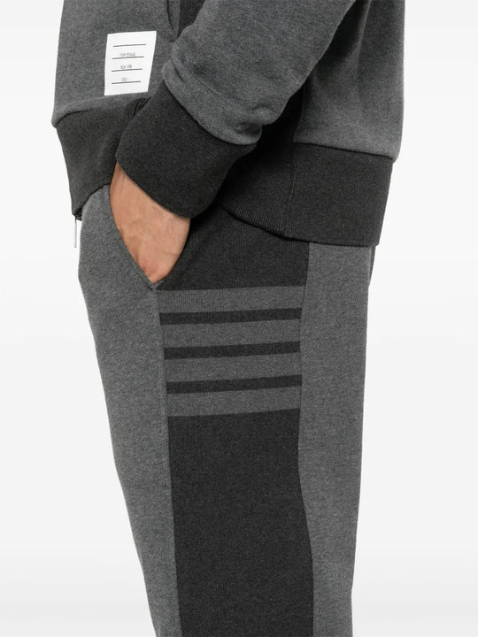 Close up of grey pants, showing texture of the cotton fabric