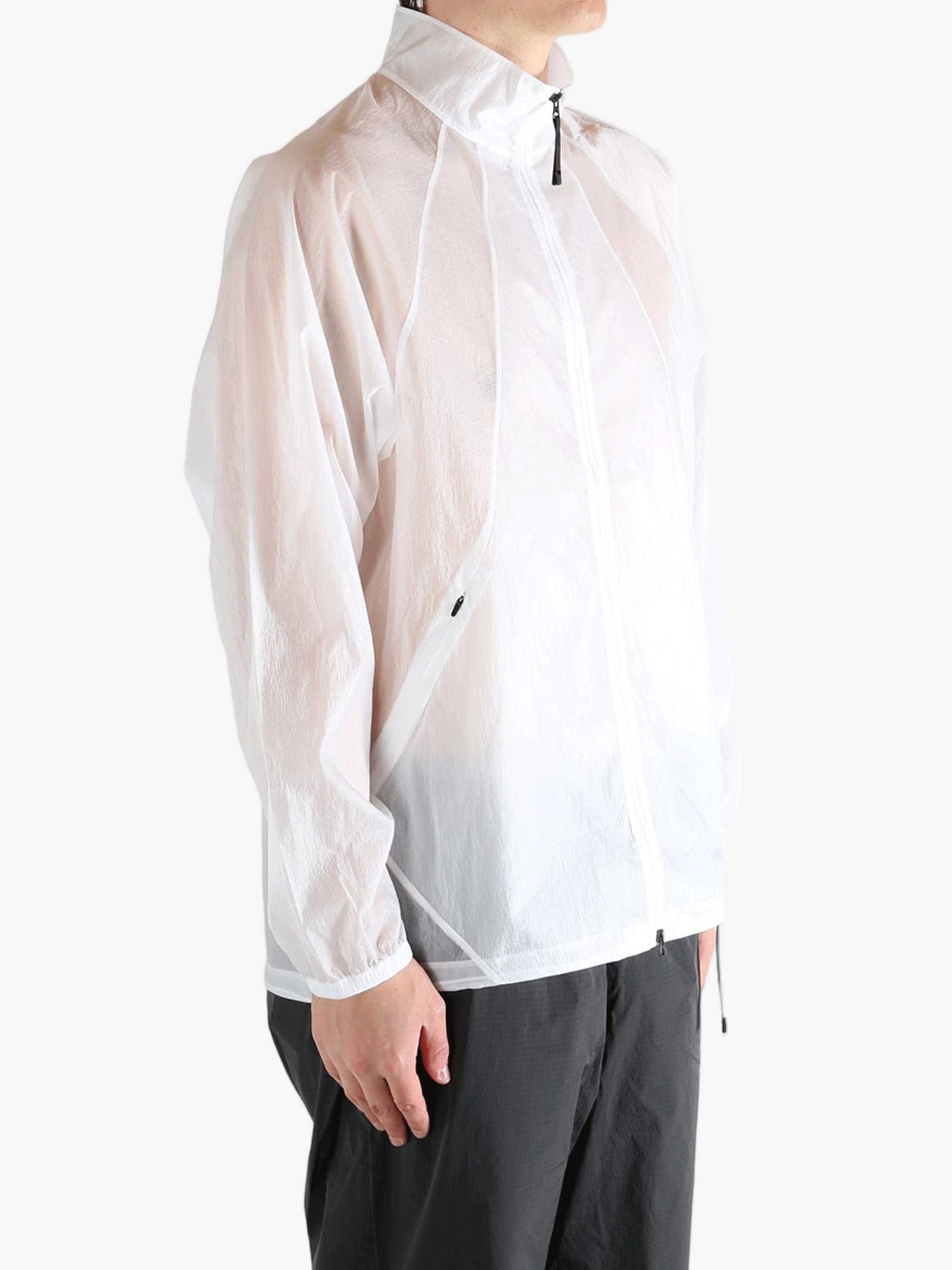 White jacket worn by a person, showing the jacket fit