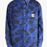 Navy shirt worn by a person, showing the shirt's fit