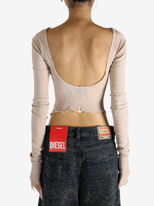 Tan top worn by a person, showing the top's fit