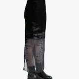 Black skirt worn by a person, showing the skirt's fit