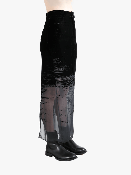 Black skirt worn by a person, showing the skirt's fit