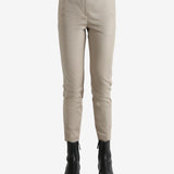 Tan pants worn  by a person, showing the pants' fit