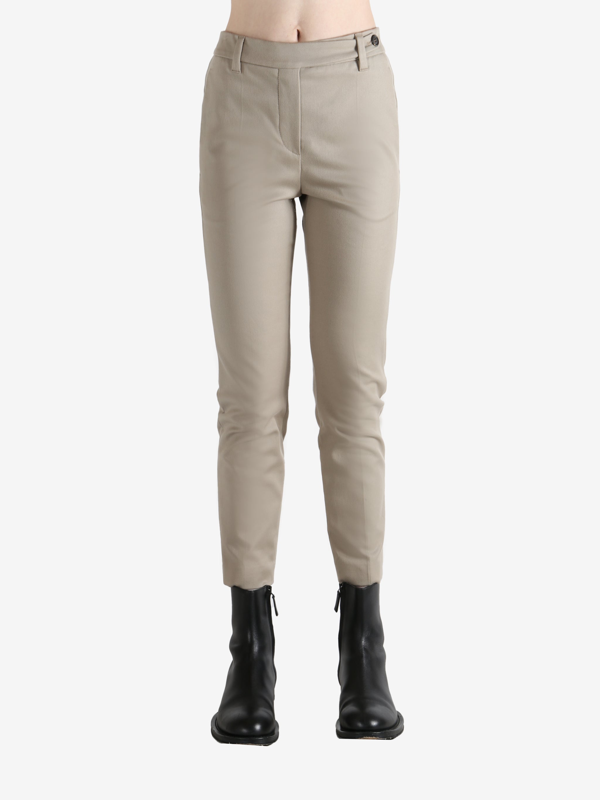 Tan pants worn  by a person, showing the pants' fit