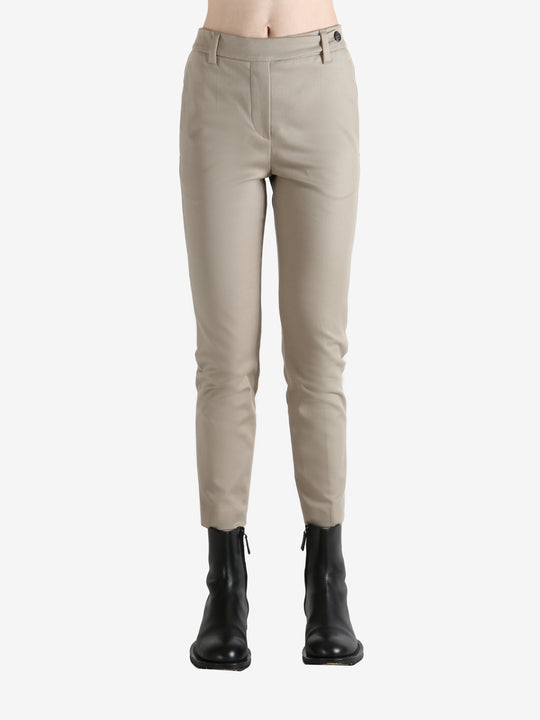 Tan pants worn  by a person, showing the pants' fit