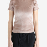 Pink t-shirt worn by a person, showing the shirt's fit