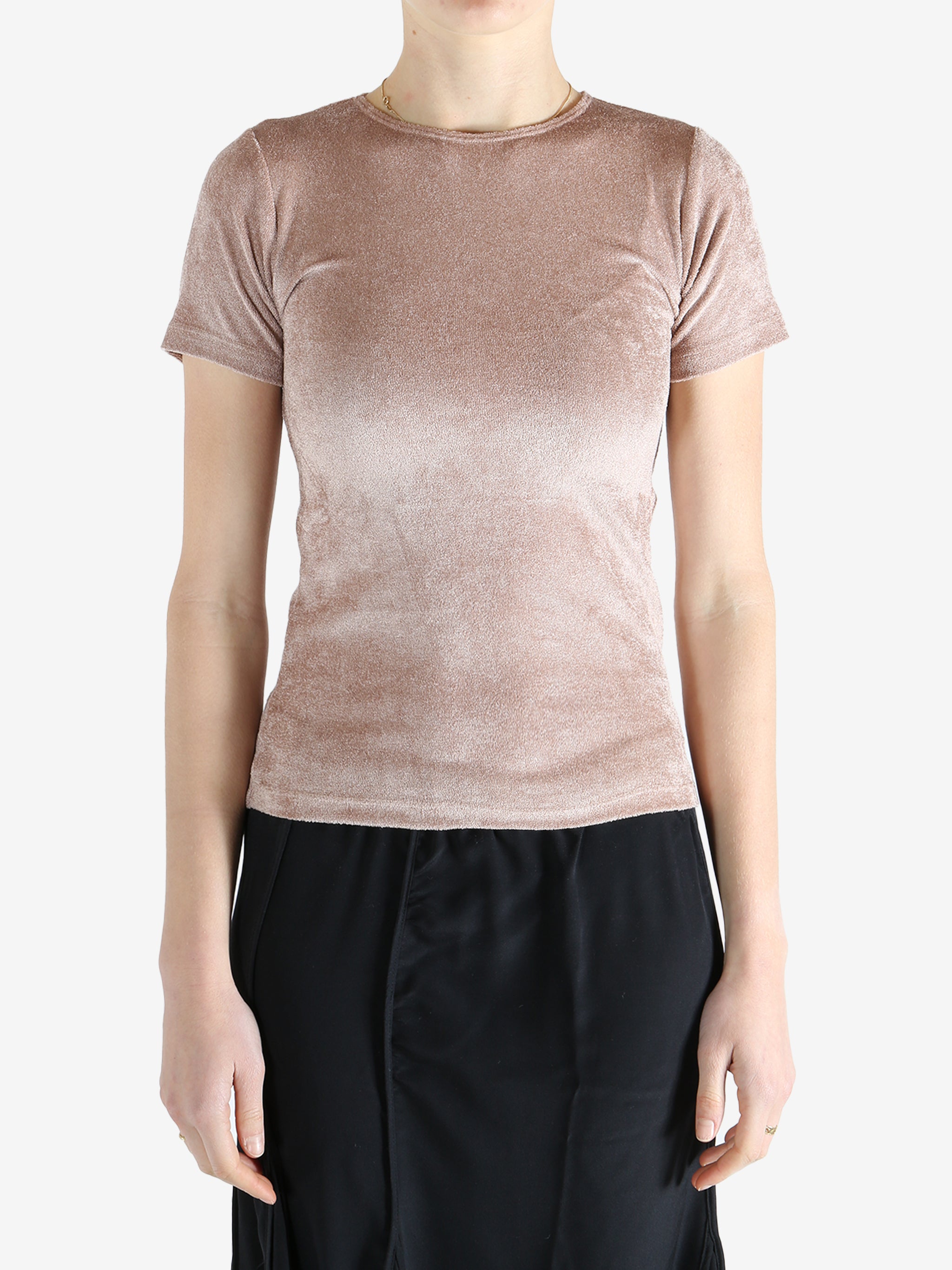 Pink t-shirt worn by a person, showing the shirt's fit