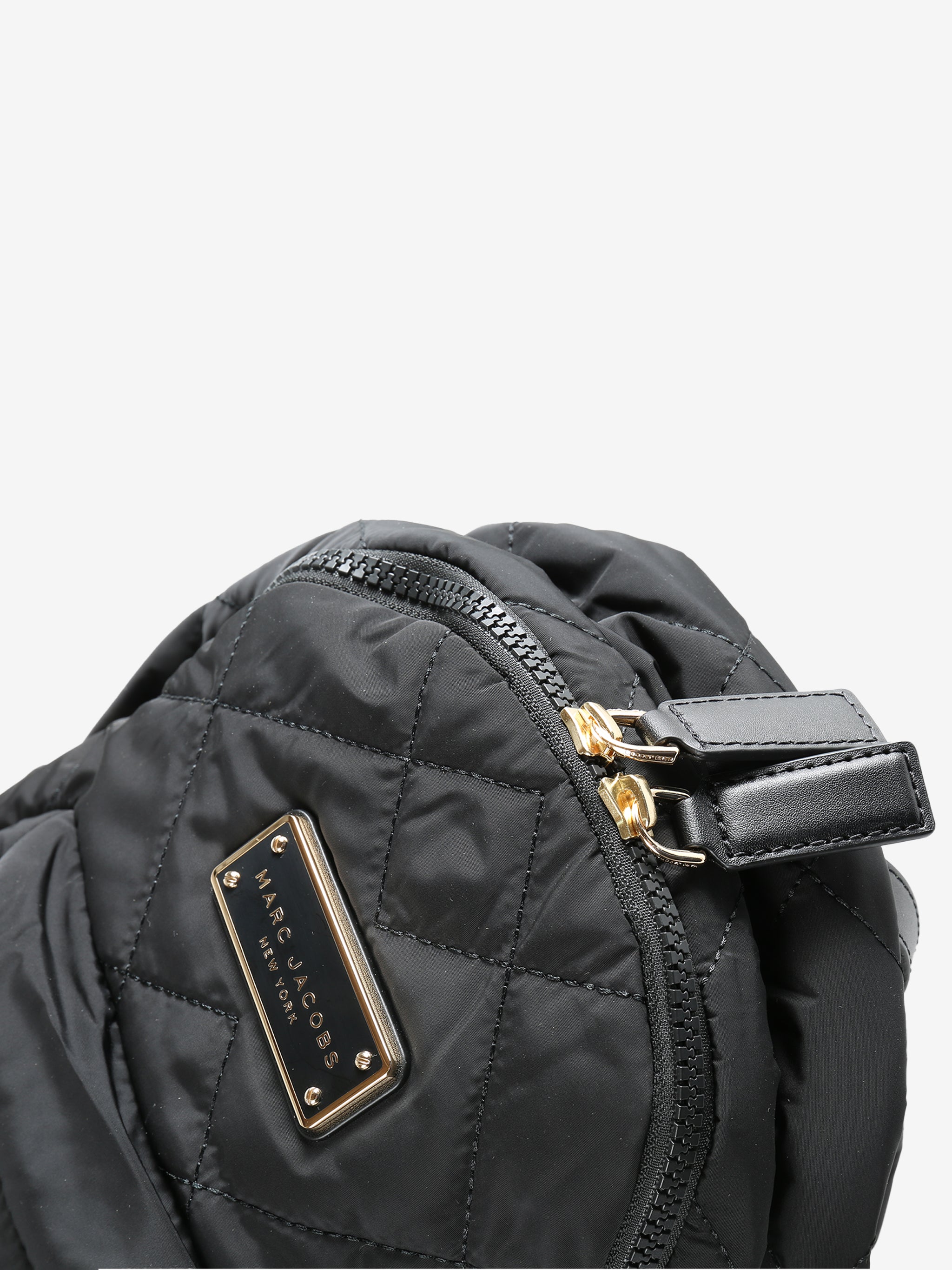 Close up of black bags, showing texture of the polyester fabric
