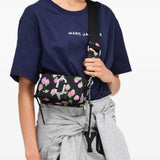 Black bag worn by a person, showing the bag fit