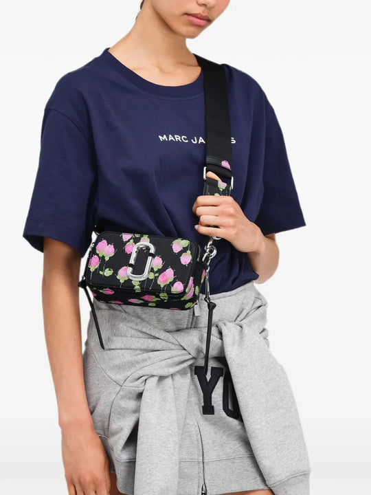 Black bag worn by a person, showing the bag fit
