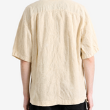 Tan shirt, full body view