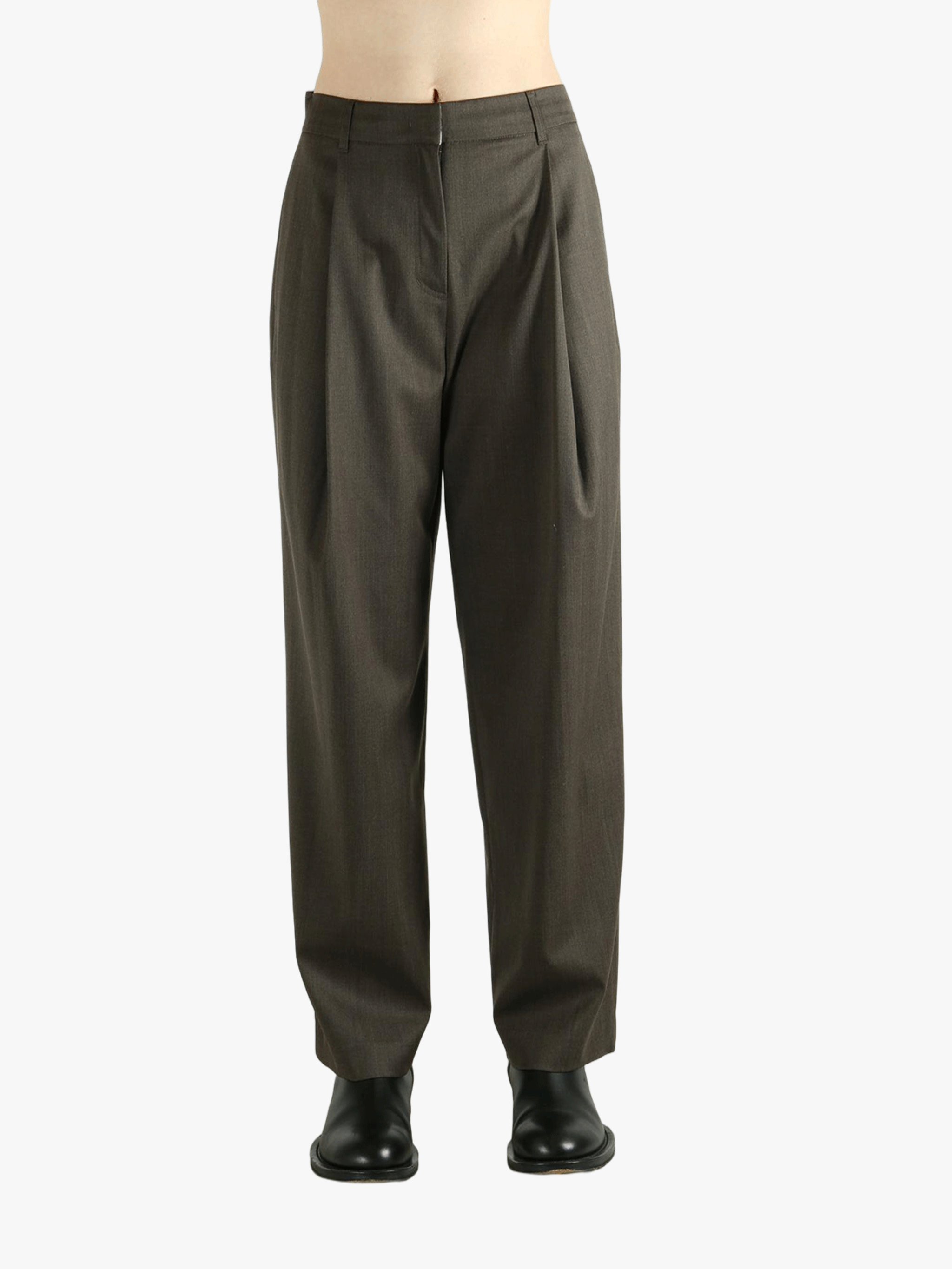 Brown pants worn by a person, showing the pants's fit