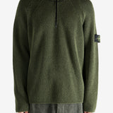 Green shirt worn by a person, showing the shirt's fit