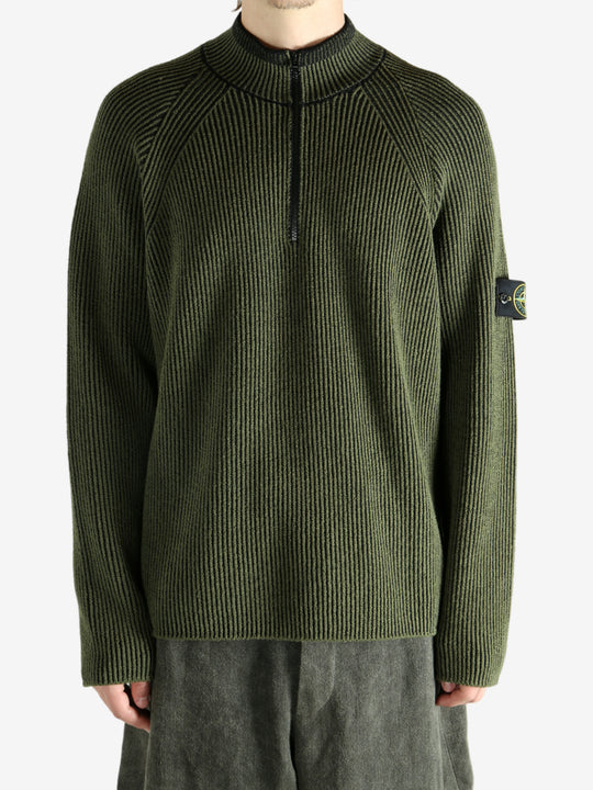 Green shirt worn by a person, showing the shirt's fit