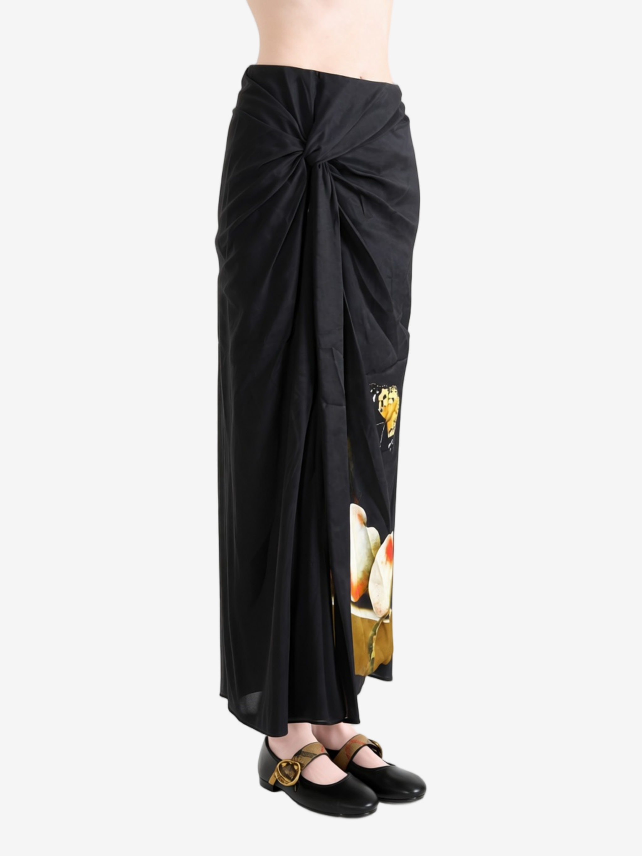 Black skirt worn by a person, showing the skirt fit