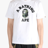 White t-shirt worn by a person, showing the shirt's fit