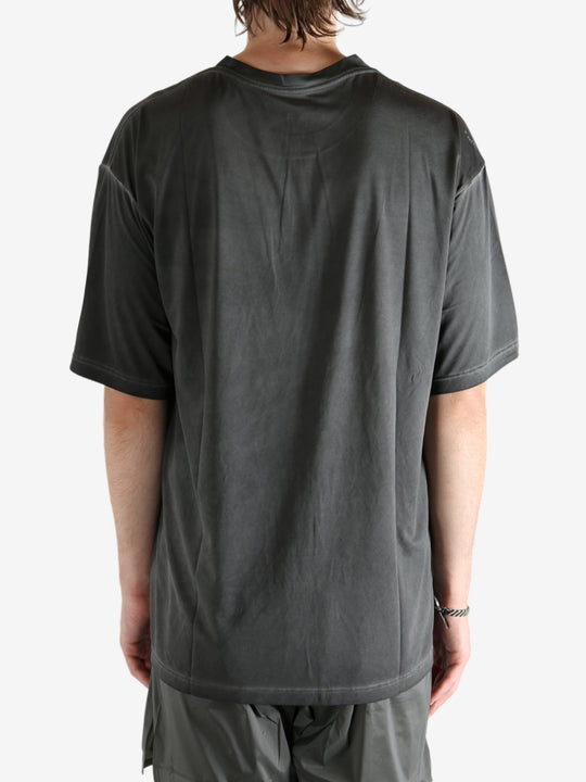 Black t-shirt worn by a person, showing the t-shirt fit