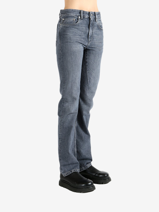 Grey pants worn by a person, showing the pants fit