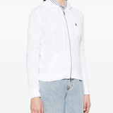 white shirt worn by a person, showing the shirt's fit
