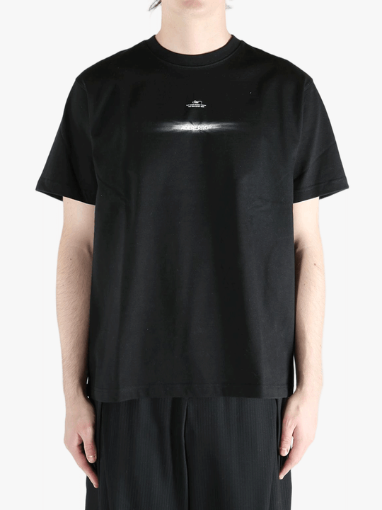 Black t-shirt worn by a person, showing the t-shirt's fit