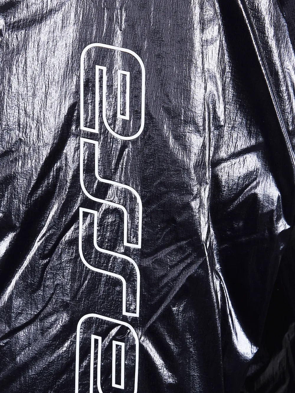 Close up of black jacket, showing texture of the fabric