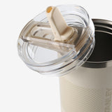 Close up of white cup,showing texture of the recycled fabric.