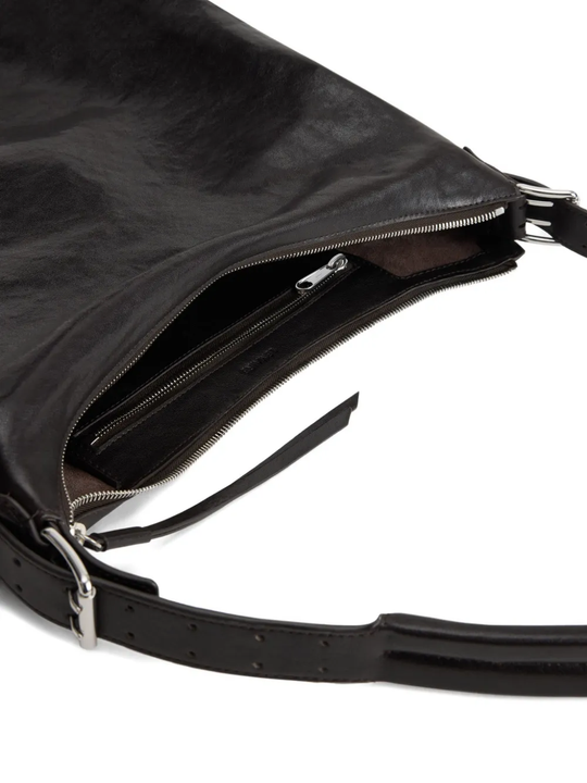 Close up of the black bag, showing texture of the leather fabric
