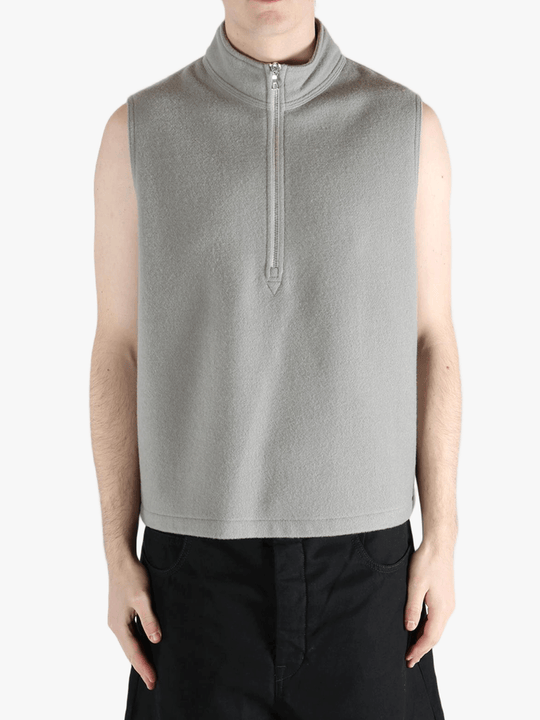 Grey top worn by a person, showing the top's fit