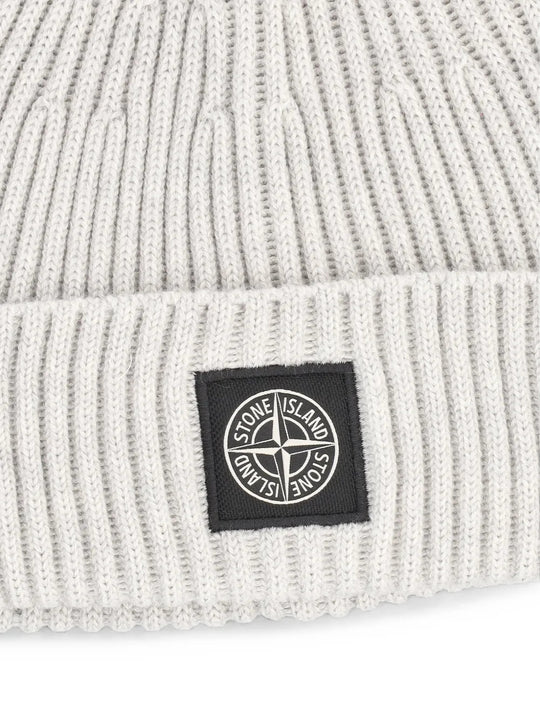 Close up of Tan hat, showing texture of the 100% virgin wool made fabric