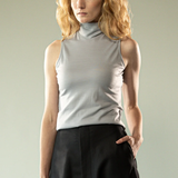 Grey top worn by a person, showing the top's fit