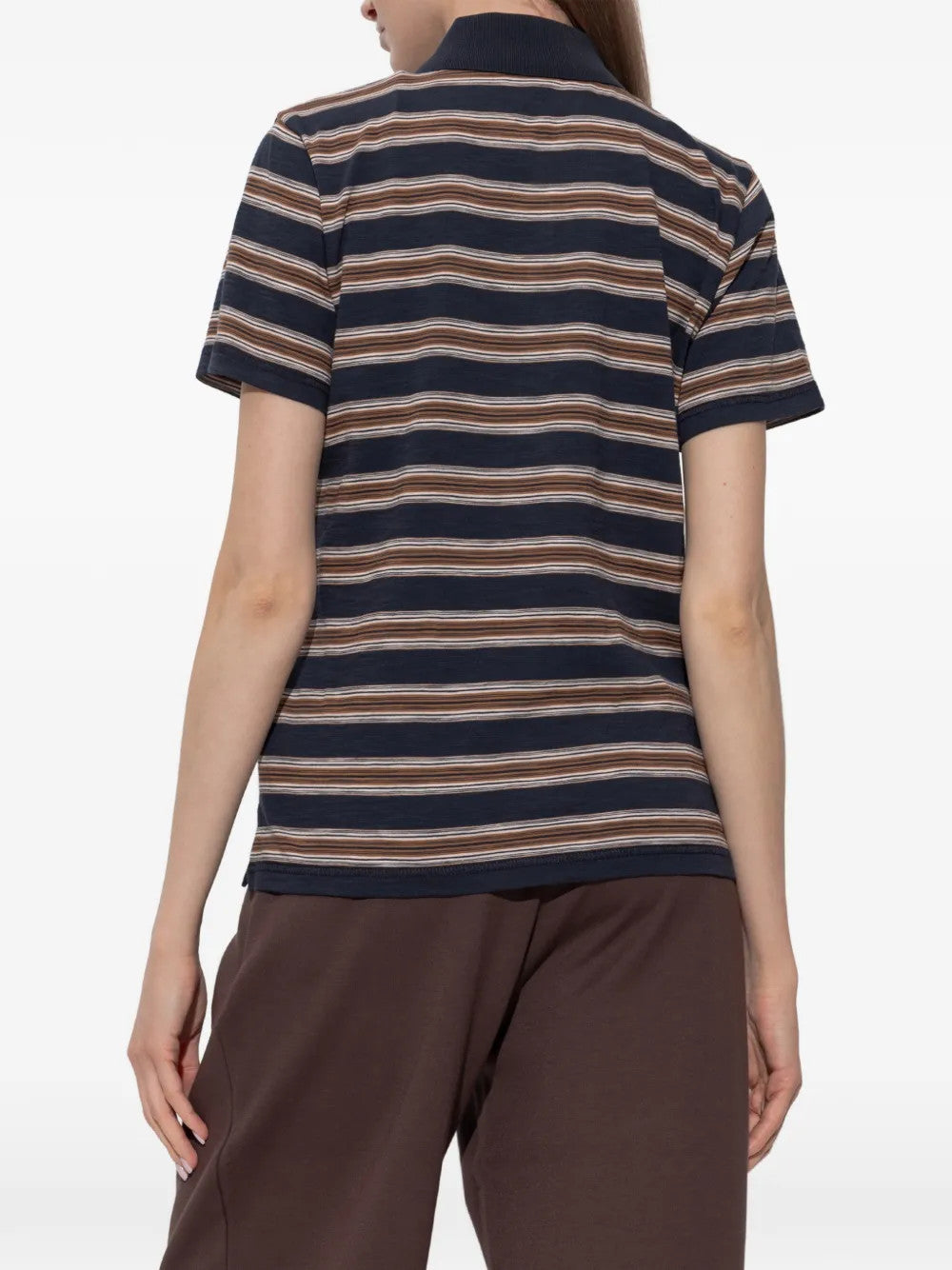 Navy top worn by a person, showing the top fit